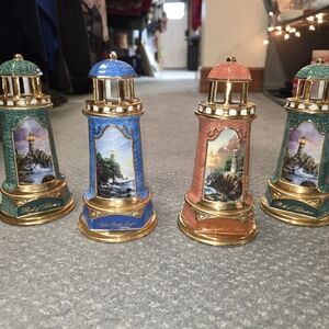 Set Of 4 Thomas Kincade Lighted Porcelain Lighthouses